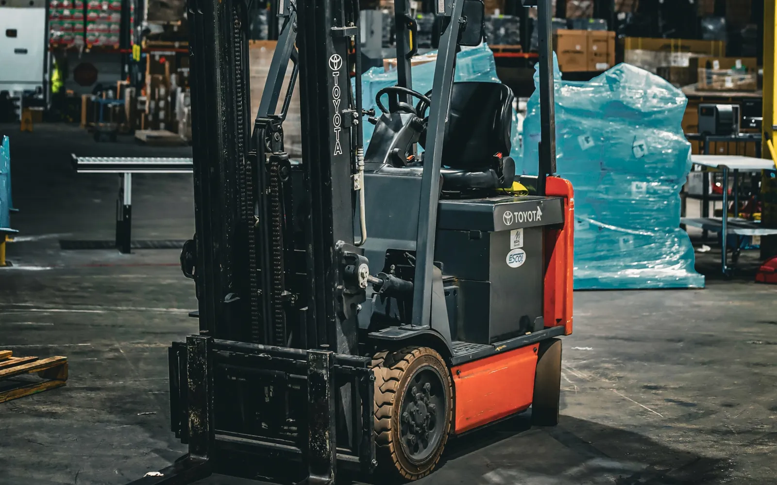 Used Toyota electric counterbalanced forklift in a warehouse, for sale in Hampton Roads