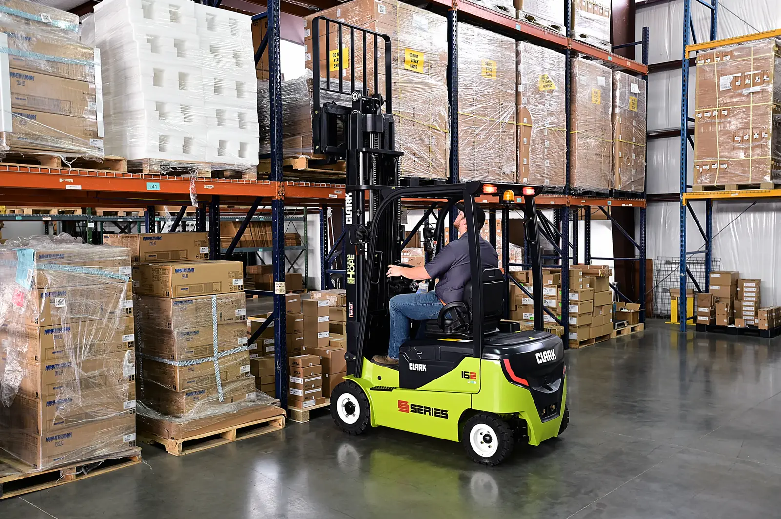 Forklift working in front of pallet racking at a warehouse in Chesapeake, VA